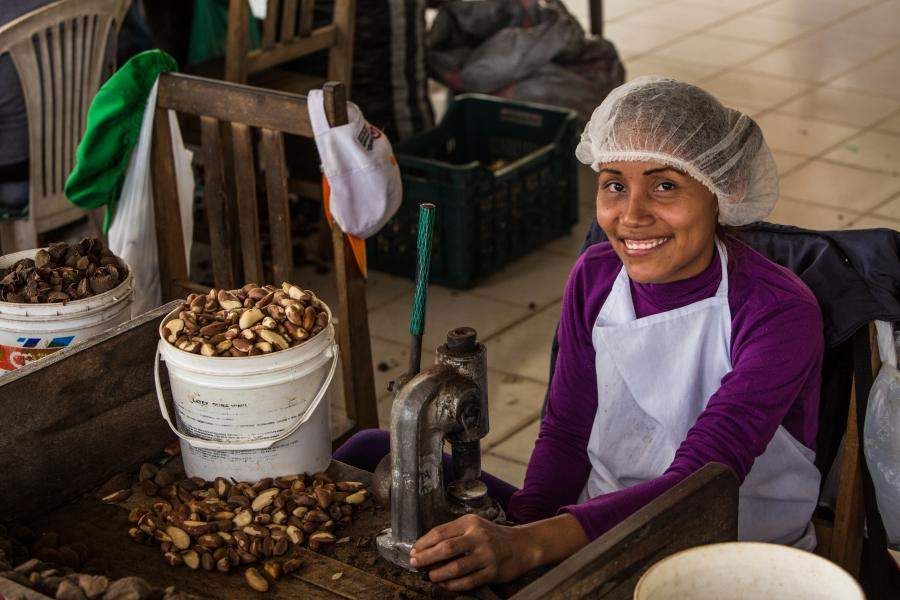 Woman in Tres Islas Brazil Nut processing facility