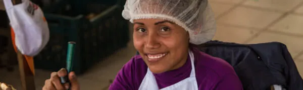 woman-brazil-nut-processing-peru.jpg