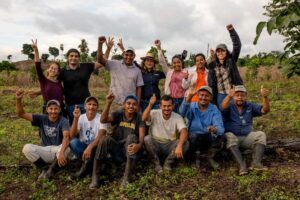Members of the Productive Forest Restoration Team are all smiles for a group photo.