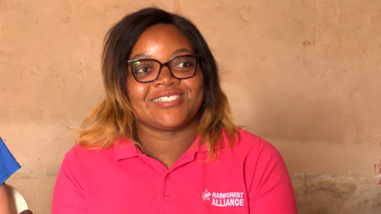 A photo of Nadege Nzoyem smiling and looking to the right of the camera.