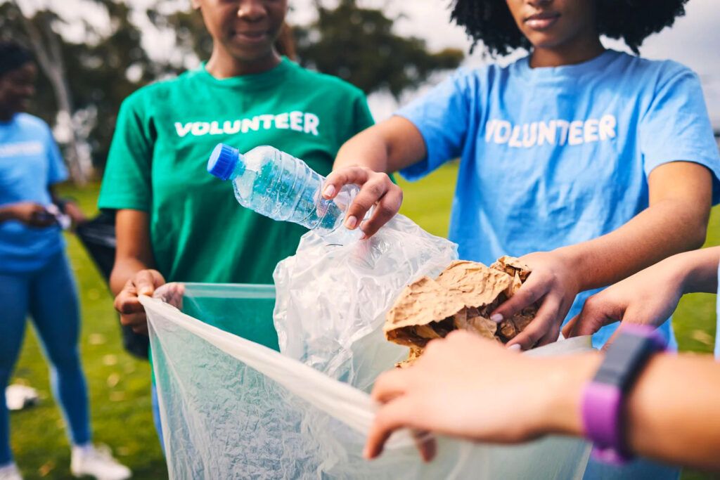 Volunteer group cleaning an outdoor park